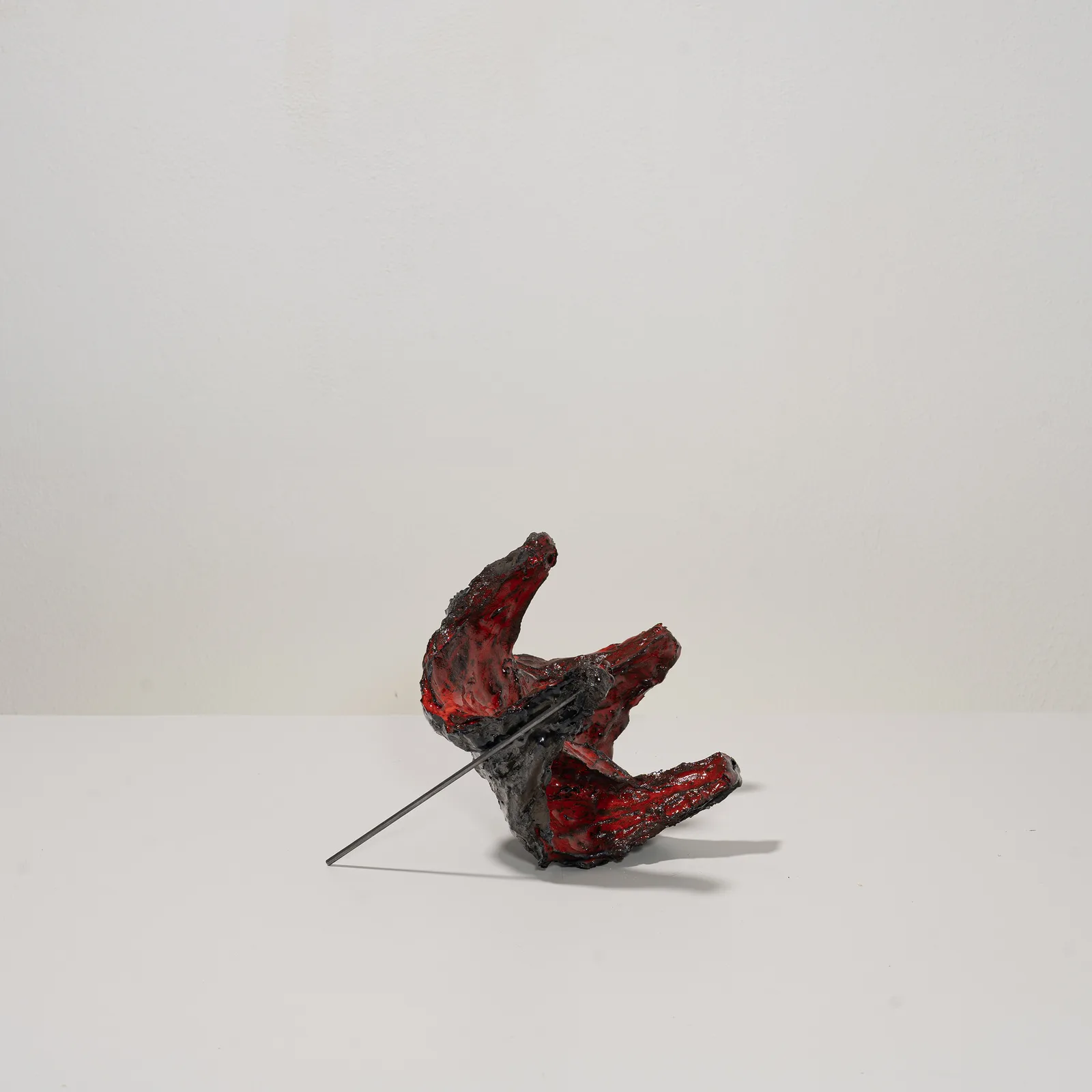 Francesca Polizzi, Elegia, 2026. Mixed clays, wool, glaze · 21 × 22 × 22 cm