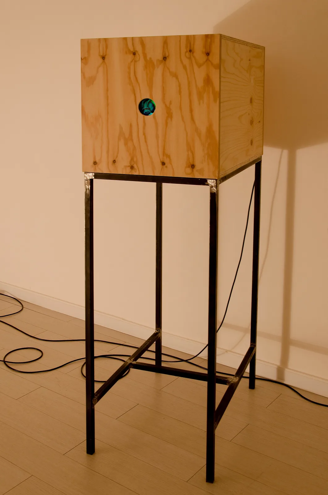 Francesco De Grandi, Mondo Nuovo #2, 2014. Wood, iron, paper, plastic, UV lights, phosphorescent paint, lens · 165 × 50 cm